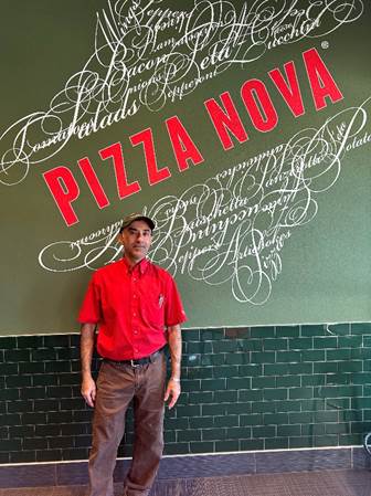 Nasir Tahiri, Pizza Nova franchisee has been serving customers throughout the renovations at his Barrie location, which started in July, December 15, 2023. Photo credit: Pizza Nova