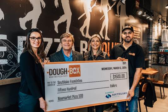 Left to right: Catherine Chown, Associate Manager of Events, Corporate & Community Partnerships, Southlake Regional Health Centre Foundation, Tom Vegh, Deputy Mayor, Tina Sinfarosa, Director of Marketing and Sagar Arora, Franchise Owner, DoughBox Newmarket.