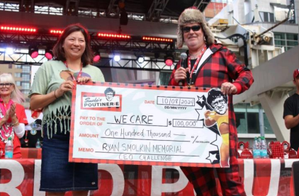 World Poutine Eating Championship Check Presentation