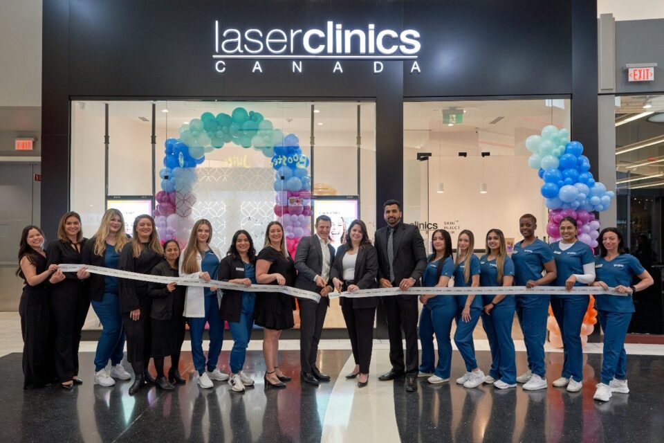 Toby Milton, Managing Director of Laser Clinics Canada, with scissors, alongside the Canadian Support Office team and the clinic’s medical aesthetician team celebrate the official opening of the brand’s eighth Canadian location, at Vaughan Mills shopping centre in Vaughan, Ontario. PHOTO CREDIT: Garry Porter